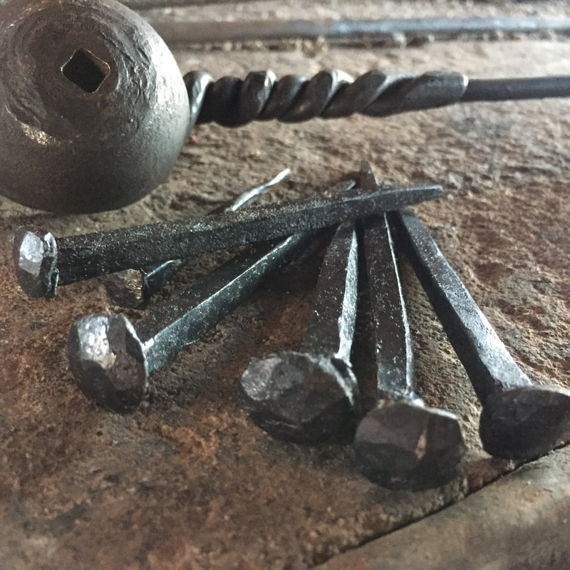 The classic blacksmith handmade nail works well as country style rustic or industrial decor.